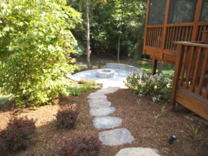 Stone pathway surrounded by mulch