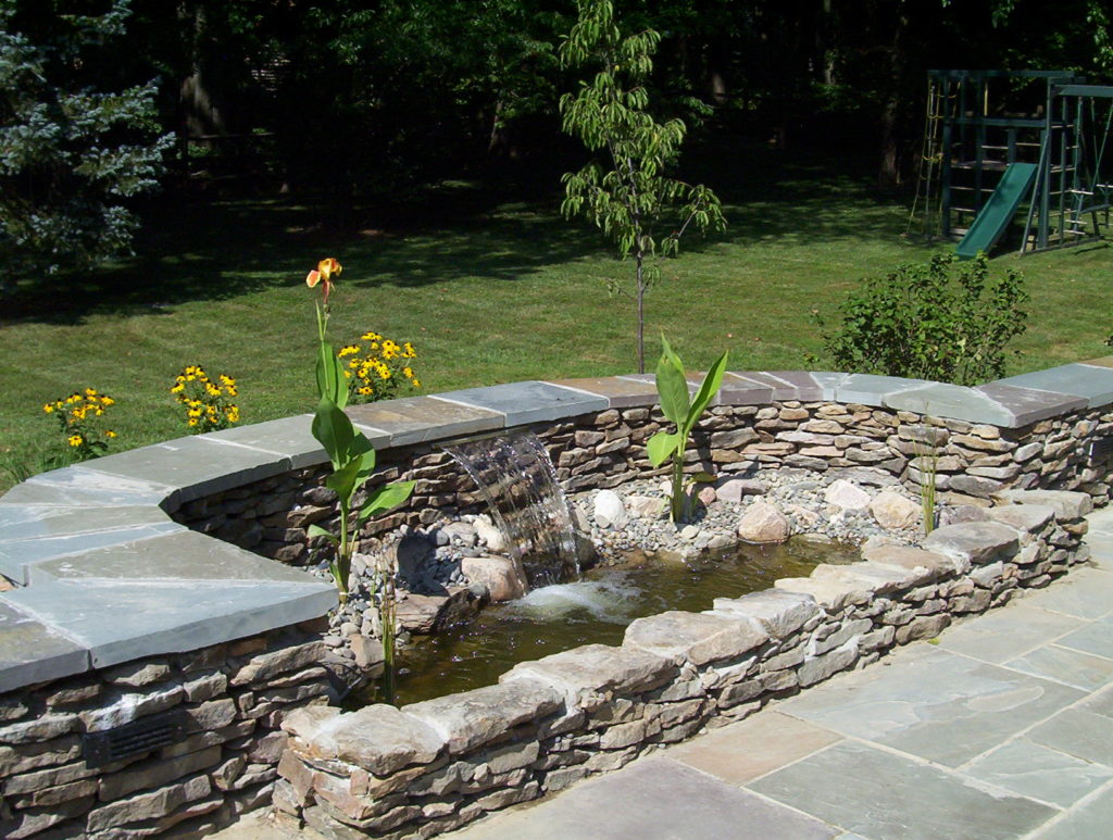 Stone Patio, Water Feature and Landscaping Project in Potomac, MD