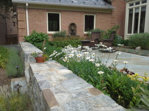 Raised stonework flowerbeds
