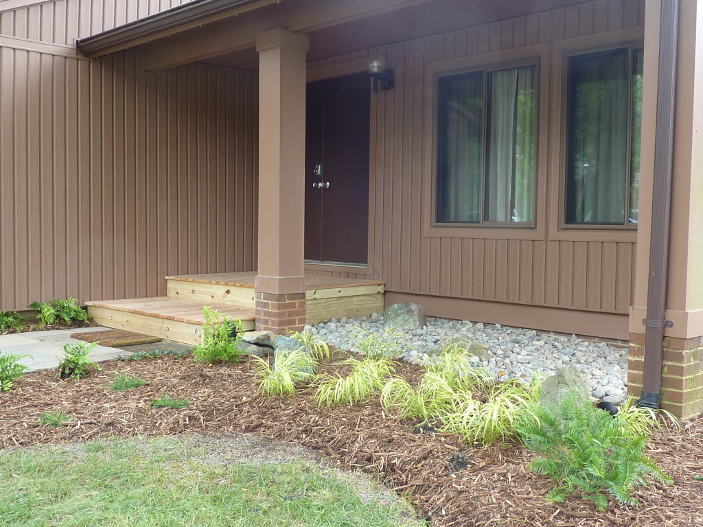 Patio Terrace in North Potomac with pillars and stone gravel