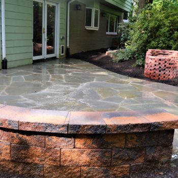 new patio with stone bench