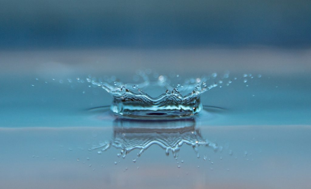 water droplet hitting water