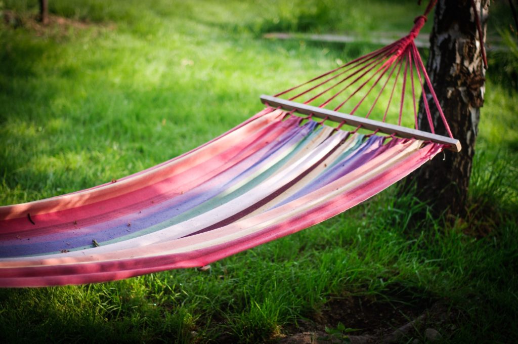Colorful hammock hanging in a garden