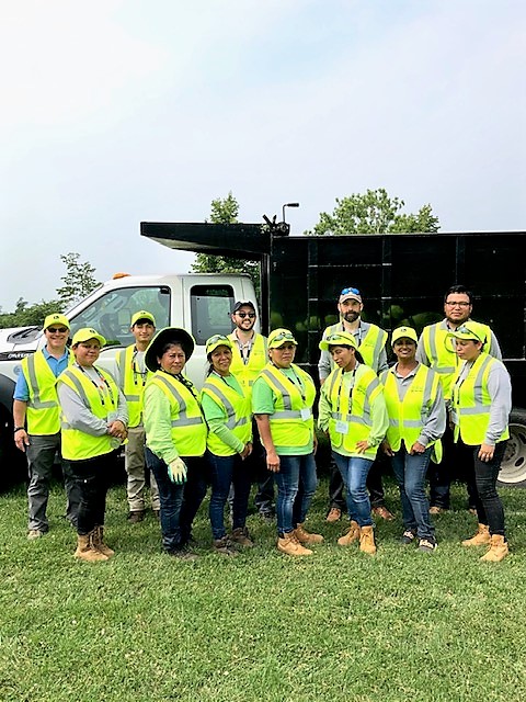 Allentuck landscaping team posing for a group photo at the national mall project