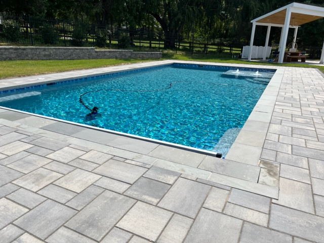 new swimming pool in a residential backyard