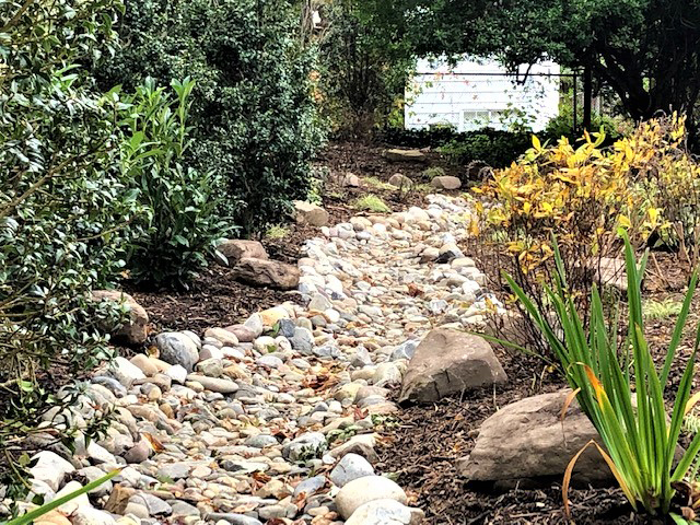 Rock bed build for landscaping drainage