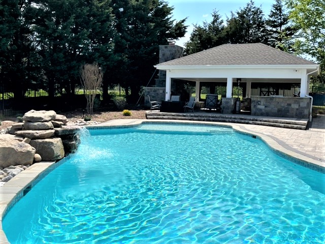 a newly transformed patio and pool area in Rockville, MD