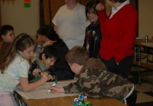 children working in a group project